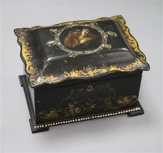 An early Victorian papier mache rectangular tea caddy, the interior with two covered sections, length 19cm